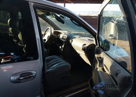 1999 Chrysler Town & Country Limited z USA, uszkodzony, nr VIN 1C4GP64L8XB916537